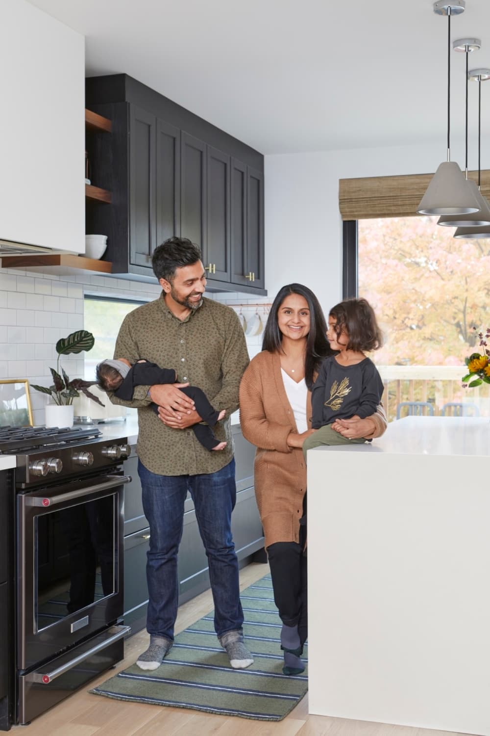 Westminster interior family in the kitchen looking at eachother